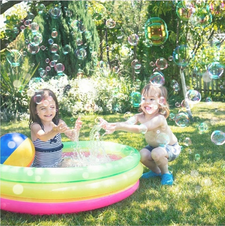TOLOCO Bubble Machine,Automatic Bubble Blower Portable Bubble Maker for Kids